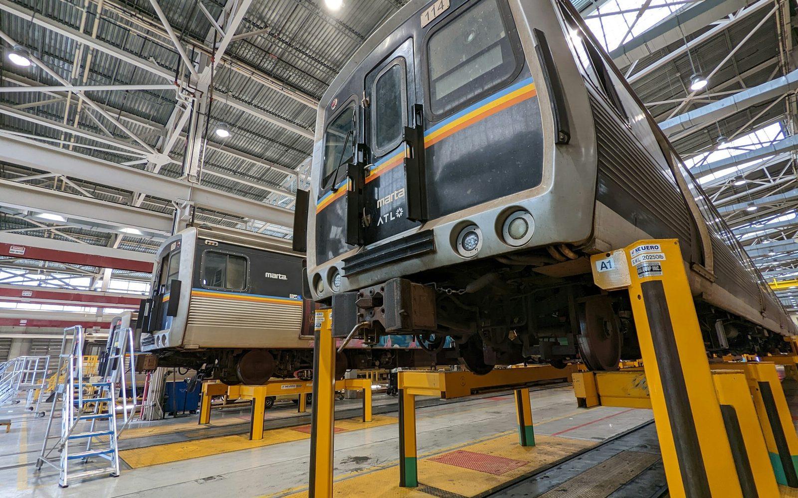 Train set under maintenance in a rail depot
